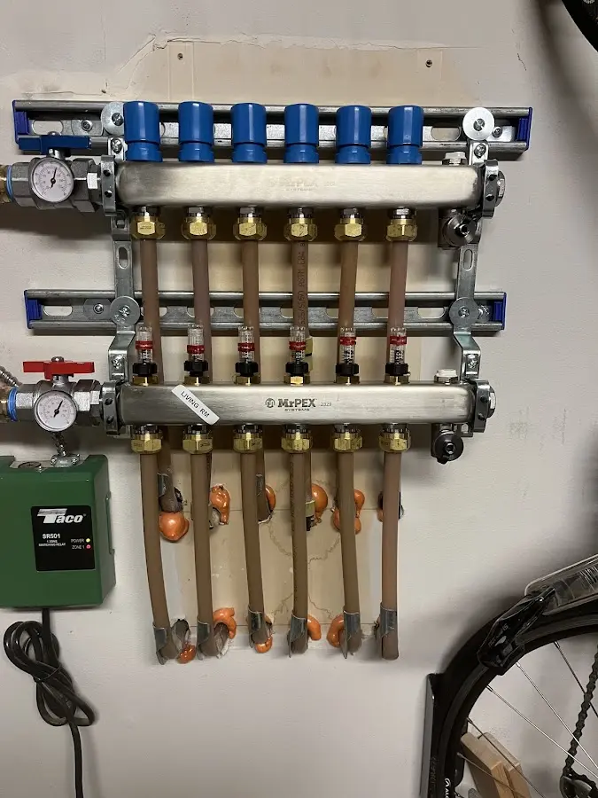 Plumber performing Water Heater Repair at a residential property in Covedale